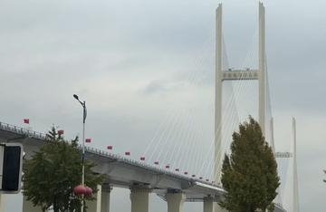 The Sino-Korean Yalu River Bridge, which links Dandong in China with Sinuiju in North Korea and was opened with a joint ceremony on Thursday