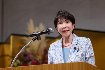 Prime Minister Sanae Takaichi speaks at a podium
