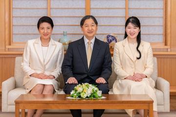 The Emperor and Empress with their daughter, Princess Aiko, right
